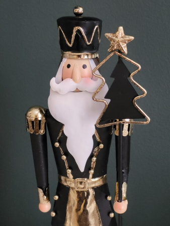 Weihnachtlicher Wachmann mit Tannenbaumstab, schwarz-gold