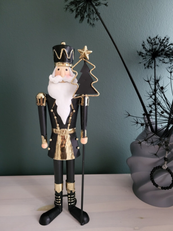 Weihnachtlicher Wachmann mit Tannenbaumstab, schwarz-gold