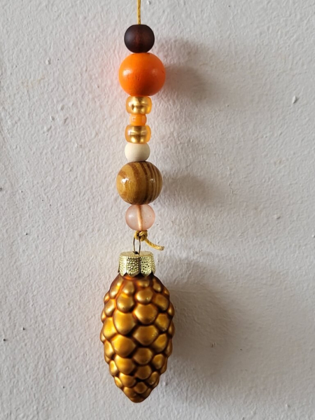 Weihnachtshänger Zapfen orange mit Roststern