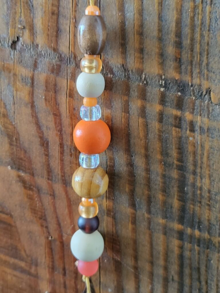 Weihnachtshänger Zapfen orange mit Roststern